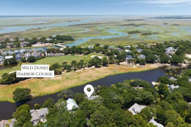 Situated on a beautiful lagoon overlooking the Wild Dunes Harbor on Wild Dunes Harbor Golf Resort in South Carolina - for sale on GolfHomes.com, golf home, golf lot