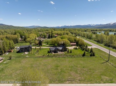 Rare vacant lot opportunity on the westbank of the Snake River on Teton Pines Golf Club in Wyoming - for sale on GolfHomes.com, golf home, golf lot