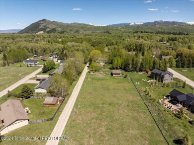 Rare vacant lot opportunity on the westbank of the Snake River on Teton Pines Golf Club in Wyoming - for sale on GolfHomes.com, golf home, golf lot