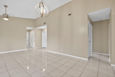 Welcome home to this beautifully updated single-story residence on Martin Downs Country Club in Florida - for sale on GolfHomes.com, golf home, golf lot