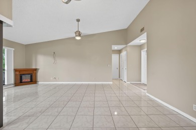 Welcome home to this beautifully updated single-story residence on Martin Downs Country Club in Florida - for sale on GolfHomes.com, golf home, golf lot