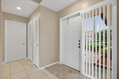 Welcome home to this beautifully updated single-story residence on Martin Downs Country Club in Florida - for sale on GolfHomes.com, golf home, golf lot