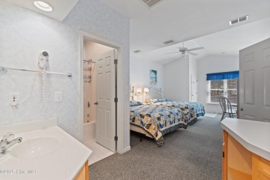 This unique Sunset Beach property in Sea Trail offers endless on Sea Trail Golf Resort in North Carolina - for sale on GolfHomes.com, golf home, golf lot