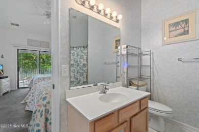This unique Sunset Beach property in Sea Trail offers endless on Sea Trail Golf Resort in North Carolina - for sale on GolfHomes.com, golf home, golf lot
