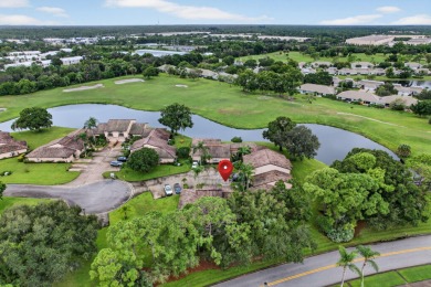 Welcome home to this beautifully updated single-story residence on Martin Downs Country Club in Florida - for sale on GolfHomes.com, golf home, golf lot