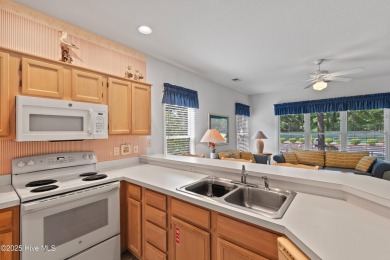 This unique Sunset Beach property in Sea Trail offers endless on Sea Trail Golf Resort in North Carolina - for sale on GolfHomes.com, golf home, golf lot