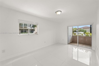 Resort-Style Living in the Heart of Doral. Light-filled  move-in on Jim McLean Signature Course in Florida - for sale on GolfHomes.com, golf home, golf lot