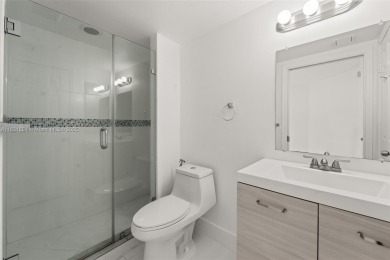 Resort-Style Living in the Heart of Doral. Light-filled  move-in on Jim McLean Signature Course in Florida - for sale on GolfHomes.com, golf home, golf lot