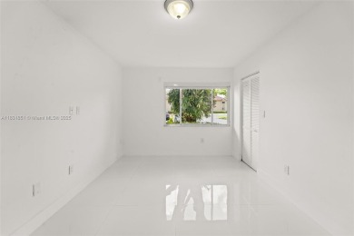 Resort-Style Living in the Heart of Doral. Light-filled  move-in on Jim McLean Signature Course in Florida - for sale on GolfHomes.com, golf home, golf lot