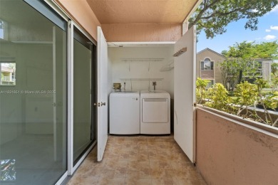 Resort-Style Living in the Heart of Doral. Light-filled  move-in on Jim McLean Signature Course in Florida - for sale on GolfHomes.com, golf home, golf lot