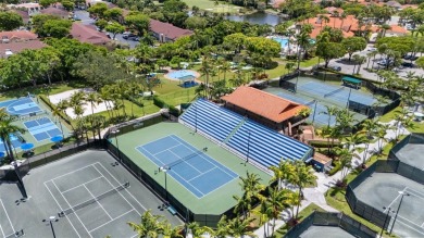 Resort-Style Living in the Heart of Doral. Light-filled  move-in on Jim McLean Signature Course in Florida - for sale on GolfHomes.com, golf home, golf lot