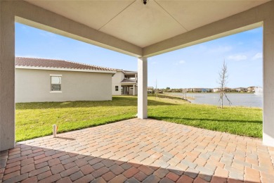 Stunning 5-bedroom with Water & Nature views! Welcome to on Eagle Creek Golf Club in Florida - for sale on GolfHomes.com, golf home, golf lot