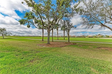 LOOKING FOR AN OPEN FLOOR PLAN COACH HOME IN RIVER STRAND, THIS on River Strand Golf and Country Club At Heritage Harbour  in Florida - for sale on GolfHomes.com, golf home, golf lot