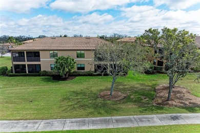 LOOKING FOR AN OPEN FLOOR PLAN COACH HOME IN RIVER STRAND, THIS on River Strand Golf and Country Club At Heritage Harbour  in Florida - for sale on GolfHomes.com, golf home, golf lot