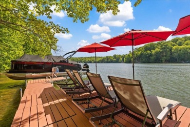 Discover this Custom Built Jubach Log Home perfectly placed on a on Hide-A-Way Hills Golf Club in Ohio - for sale on GolfHomes.com, golf home, golf lot