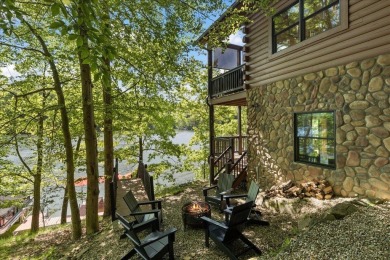 Discover this Custom Built Jubach Log Home perfectly placed on a on Hide-A-Way Hills Golf Club in Ohio - for sale on GolfHomes.com, golf home, golf lot