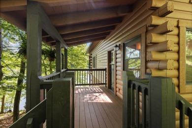 Discover this Custom Built Jubach Log Home perfectly placed on a on Hide-A-Way Hills Golf Club in Ohio - for sale on GolfHomes.com, golf home, golf lot