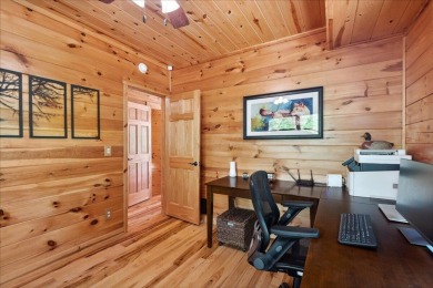 Discover this Custom Built Jubach Log Home perfectly placed on a on Hide-A-Way Hills Golf Club in Ohio - for sale on GolfHomes.com, golf home, golf lot