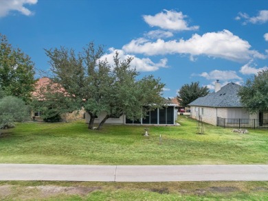 This warm, open floor plan lives large with rooms overlooking on Delaware Springs Golf Course in Texas - for sale on GolfHomes.com, golf home, golf lot