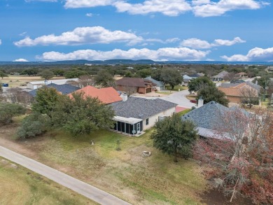 This warm, open floor plan lives large with rooms overlooking on Delaware Springs Golf Course in Texas - for sale on GolfHomes.com, golf home, golf lot