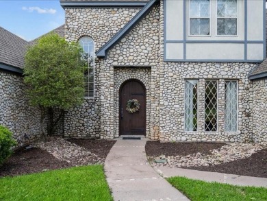 This stunning home, located at the corner of holes 15 and 16 on The Lake Country Club - Lake Waco in Texas - for sale on GolfHomes.com, golf home, golf lot