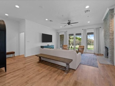 This stunning home, located at the corner of holes 15 and 16 on The Lake Country Club - Lake Waco in Texas - for sale on GolfHomes.com, golf home, golf lot