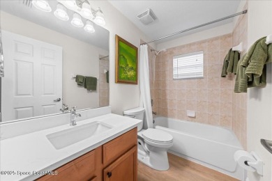 Wake up to serene water views and unwind with a cup of on Majors Golf Club At Bayside Lakes in Florida - for sale on GolfHomes.com, golf home, golf lot