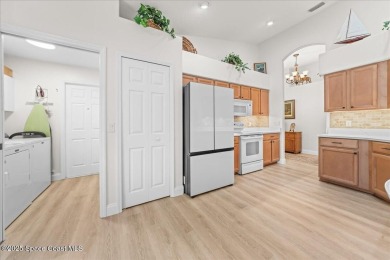 Wake up to serene water views and unwind with a cup of on Majors Golf Club At Bayside Lakes in Florida - for sale on GolfHomes.com, golf home, golf lot