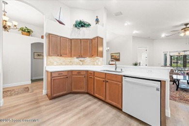Wake up to serene water views and unwind with a cup of on Majors Golf Club At Bayside Lakes in Florida - for sale on GolfHomes.com, golf home, golf lot