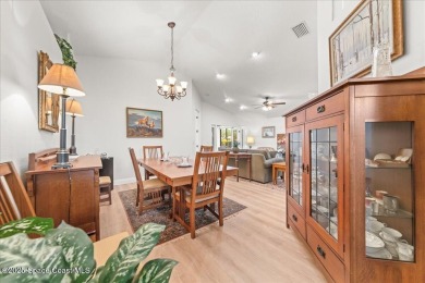 Wake up to serene water views and unwind with a cup of on Majors Golf Club At Bayside Lakes in Florida - for sale on GolfHomes.com, golf home, golf lot
