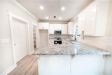 Needs paint, flooring and light deferred maintenance. Short sale on Bella Vista - Metfield Golf Complex and Country Club in Arkansas - for sale on GolfHomes.com, golf home, golf lot