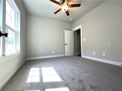 Needs paint, flooring and light deferred maintenance. Short sale on Bella Vista - Metfield Golf Complex and Country Club in Arkansas - for sale on GolfHomes.com, golf home, golf lot