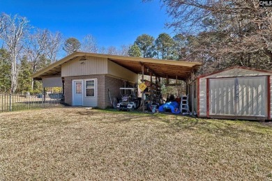 Set on a scenic 4.05-acre lot, this 3,300 sq. ft. home offers a on Lake Murray Golf Center in South Carolina - for sale on GolfHomes.com, golf home, golf lot