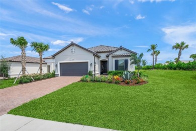 Welcome to this stunning 3 bedroom plus den sanctuary, where on Esplanade Golf and Country at Lakewood Ranch in Florida - for sale on GolfHomes.com, golf home, golf lot