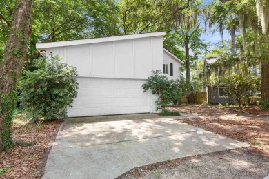 Welcome to this charming 4-bedroom, 2-bathroom home tucked away on Golf Club At Wescott Plantation in South Carolina - for sale on GolfHomes.com, golf home, golf lot