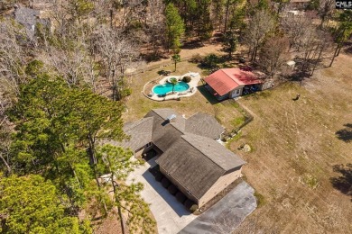 Set on a scenic 4.05-acre lot, this 3,300 sq. ft. home offers a on Lake Murray Golf Center in South Carolina - for sale on GolfHomes.com, golf home, golf lot