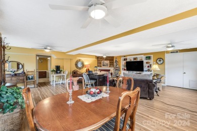 Priced UNDER recent appraisal, this expansive 6 bedroom home on Waynesville Country Club Inn in North Carolina - for sale on GolfHomes.com, golf home, golf lot