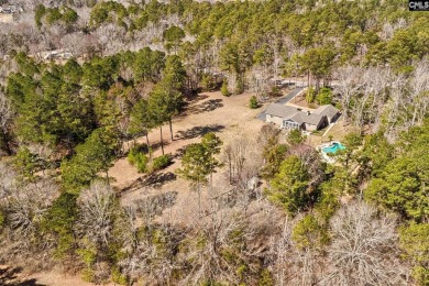 Set on a scenic 4.05-acre lot, this 3,300 sq. ft. home offers a on Lake Murray Golf Center in South Carolina - for sale on GolfHomes.com, golf home, golf lot