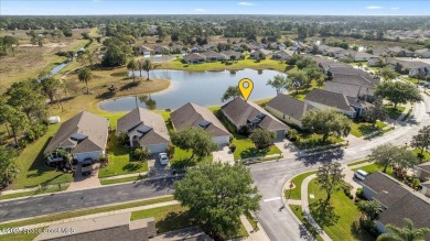 Wake up to serene water views and unwind with a cup of on Majors Golf Club At Bayside Lakes in Florida - for sale on GolfHomes.com, golf home, golf lot