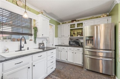 Come see this charming house on the corner! This 3 bed, 2 on Vache-Grasse Country Club in Arkansas - for sale on GolfHomes.com, golf home, golf lot