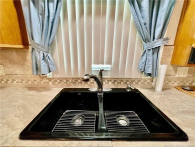Invite your family & friends to this spacious 2030 sq ft home on Indianwood Golf and Country Club in Florida - for sale on GolfHomes.com, golf home, golf lot