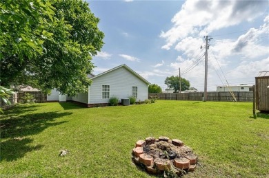 Come see this charming house on the corner! This 3 bed, 2 on Vache-Grasse Country Club in Arkansas - for sale on GolfHomes.com, golf home, golf lot