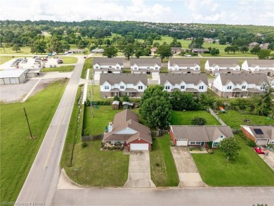 Come see this charming house on the corner! This 3 bed, 2 on Vache-Grasse Country Club in Arkansas - for sale on GolfHomes.com, golf home, golf lot