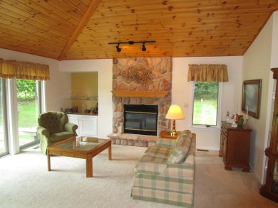 This beautiful well maintained 4 bedroom 3 bath condo is on Michaywe Pines Course in Michigan - for sale on GolfHomes.com, golf home, golf lot