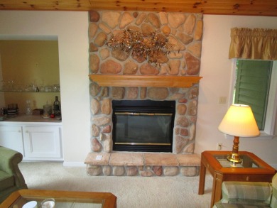 This beautiful well maintained 4 bedroom 3 bath condo is on Michaywe Pines Course in Michigan - for sale on GolfHomes.com, golf home, golf lot