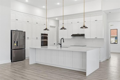 Welcome to this luxurious, modern, custom-built home perfectly on Rotonda Golf and Country Club - Long Marsh  in Florida - for sale on GolfHomes.com, golf home, golf lot