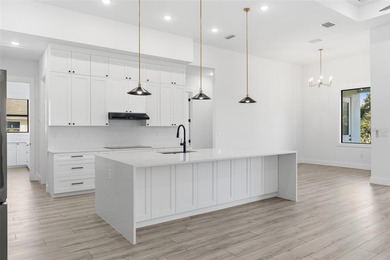 Welcome to this luxurious, modern, custom-built home perfectly on Rotonda Golf and Country Club - Long Marsh  in Florida - for sale on GolfHomes.com, golf home, golf lot