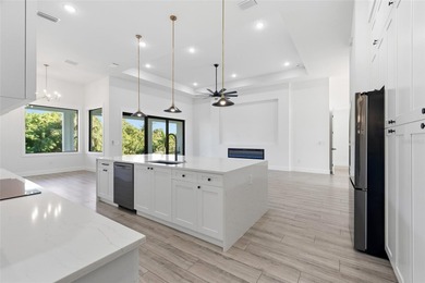 Welcome to this luxurious, modern, custom-built home perfectly on Rotonda Golf and Country Club - Long Marsh  in Florida - for sale on GolfHomes.com, golf home, golf lot