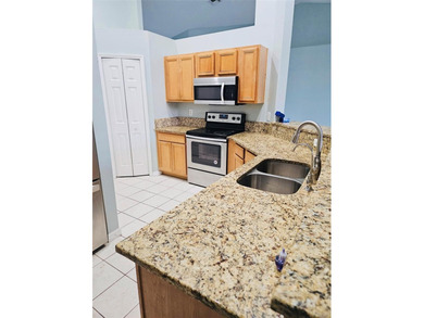 Move-In Ready in Gated Harbor Hills Golf Community - NEW ROOF on Harbor Hills Country Club in Florida - for sale on GolfHomes.com, golf home, golf lot