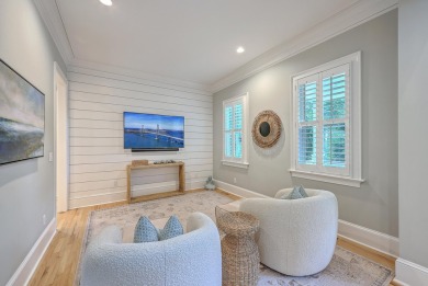 Welcome to this elevated 5-bedroom, 4.5-bathroom coastal retreat on Wild Dunes Harbor Golf Resort in South Carolina - for sale on GolfHomes.com, golf home, golf lot